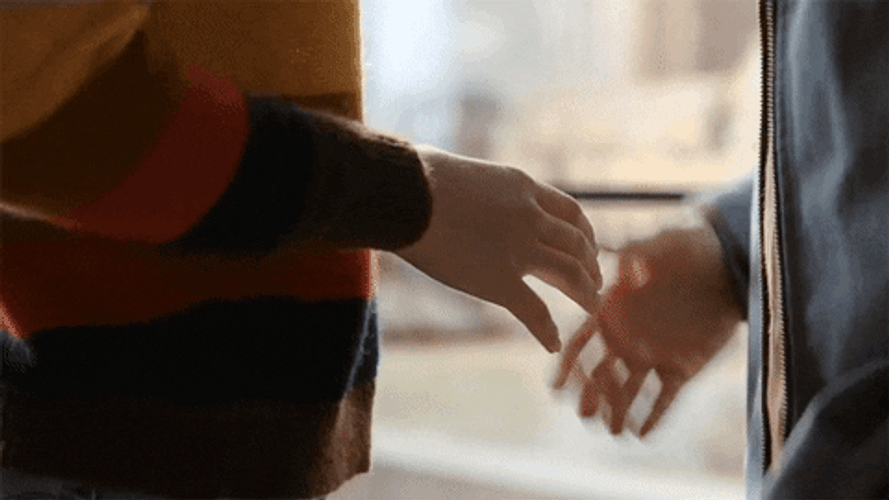 gif showing shaking hands